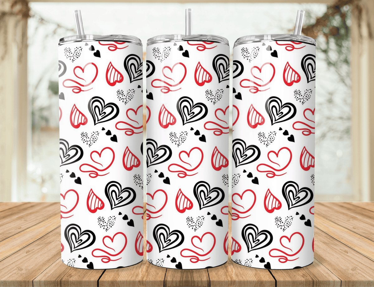 20oz stainless steel tumbler with red, black, and white heart pattern, clear straw