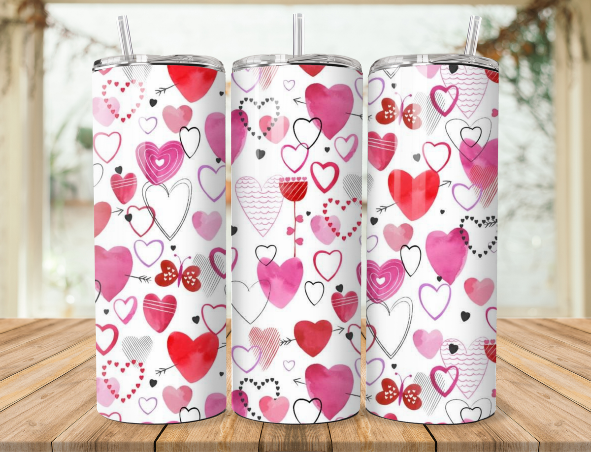 20oz stainless steel tumbler with mixed pink and red heart icons, clear straw